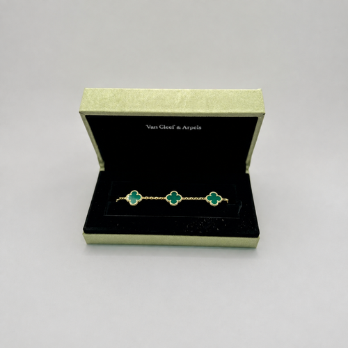 Pulsera Van Cleef tres tréboles dorada verde malaquita